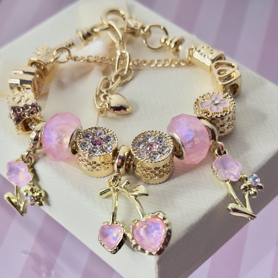 Pulsera Cereza Rosa: cristales rosa y cerezas en forma de corazón