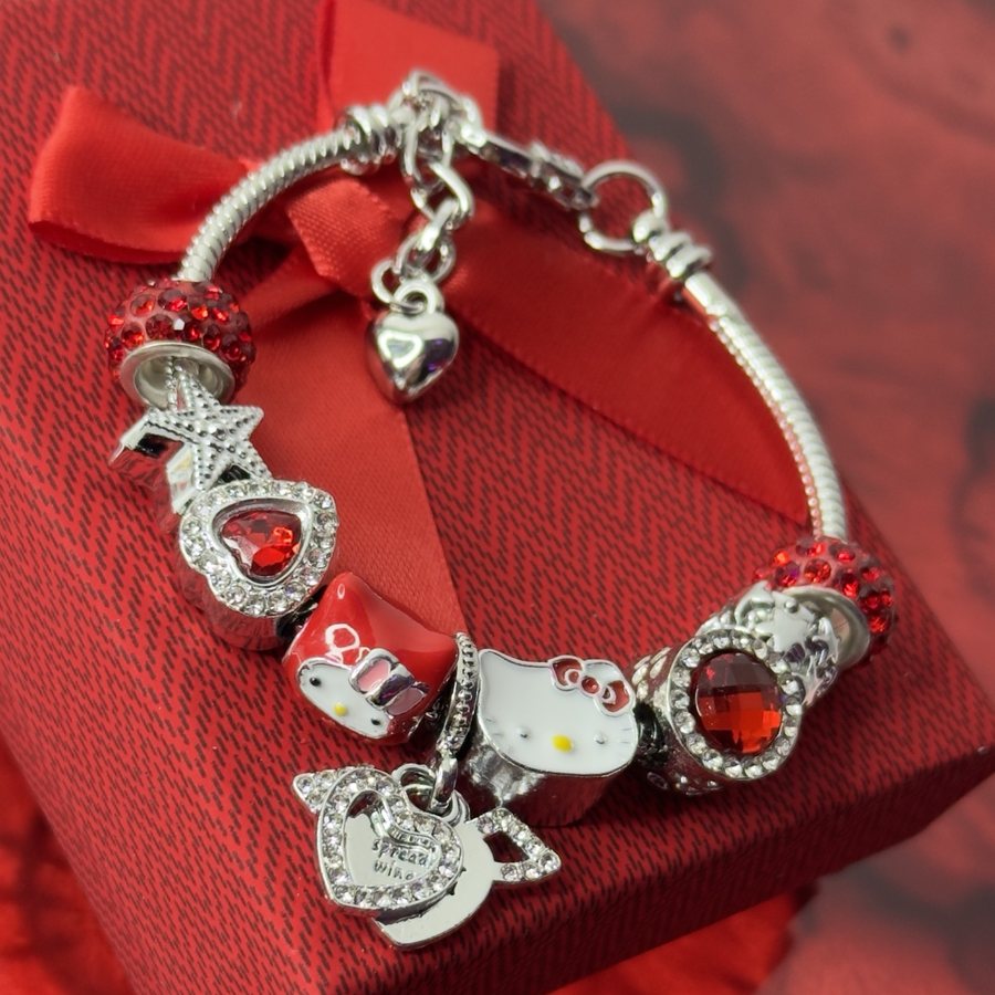 Pulsera Rojo Pasión: cristales rojos, estrella y corazones brillantes